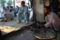 Fixing bicycles, Afghanistan